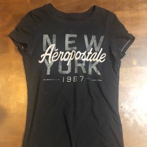 Tight shirt with white and gray writing